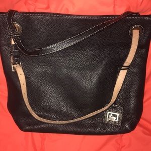 Black and a cream color on the strap-shoulder bag